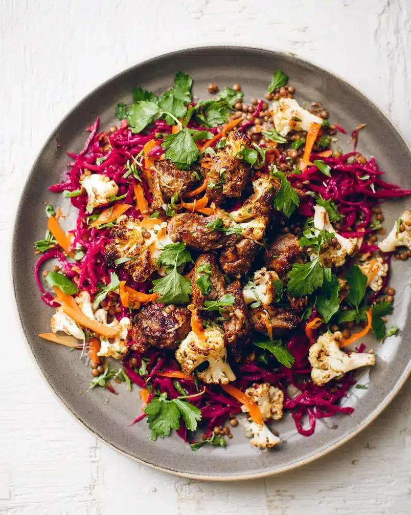 Sticky honey lamb with carrot and lentil slaw 3 Recipe preparation image